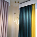 Moderne LED-Pendelleuchte Ellipse mit Höhenverstellung