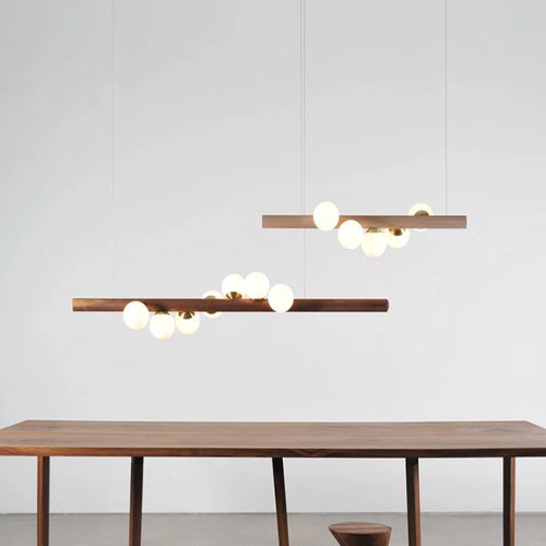 Kronleuchter aus Nussbaumholz und Glas im modernen Design für ein elegantes Interieur - vue 2 sur 13
