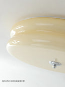 Retro-Deckenleuchte aus Glas für einen eleganten nordischen Stil