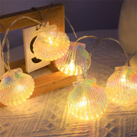 Lichterkette mit Muscheln für maritimes Dekor, Party und Hochzeit