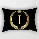 housse de coussin décorative motif lettres noires et dorées