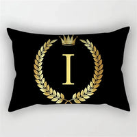 housse de coussin décorative motif lettres noires et dorées