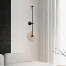Wandleuchte LED aus Naturstein und rundem Metall