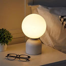 lampe à poser en marbre et verre pour intérieur élégant