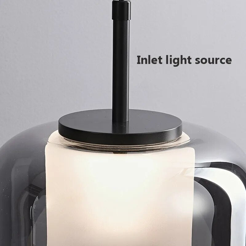 Moderne LED-Pendelleuchte aus rauchgrauem Glas mit drei Köpfen - vue 4 sur 11