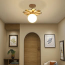 Nordische Wandleuchte aus Holz mit schwenkbarem Arm und LED