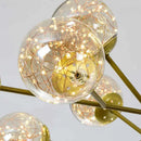 lustre moderne en forme d'étoile avec abat-jour en verre décoratif