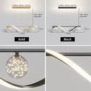 Kronleuchter Sandyha LED Sterne aus klarem Glas als Pendelleuchte