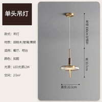 Moderne Pendelleuchte aus Glas mit dekorativer LED-Beleuchtung