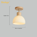 lustre en bois simple avec abat-jour en verre