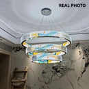 Moderner dimmbarer LED-Kronleuchter aus Stahl mit dekorativem Ring