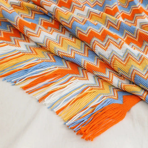 Plaid bohème tricoté à pompons pour canapé lit