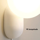 Minimalistische Wandleuchte in Creme mit dekorativen LED-Lichtern