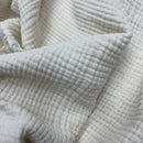 Plaid coton mousseline pompons léger style uni salon