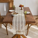 Chemin de table bohème beige à pompons géométriques