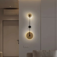 Wandleuchte LED aus Naturstein und rundem Metall