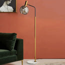 Elegante Stehleuchte in Gold und Schwarz aus Metall und Glas