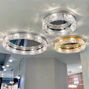 Moderner Kronleuchter rund aus Kristall und Chrom mit nordischem LED-Design