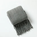 Plaid nordique carreaux style boheme doux pompons