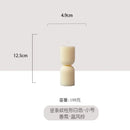 bougies-parfum-es-artisanales-avec-colonnes-ray-es-et-carillons-oliens-7.png