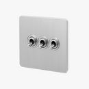 interrupteur-triple-3-voies-en-acier-gris-clair-bross-bords-arrondis-0.png