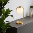 Lampe de chevet design en métal doré et boule en verre