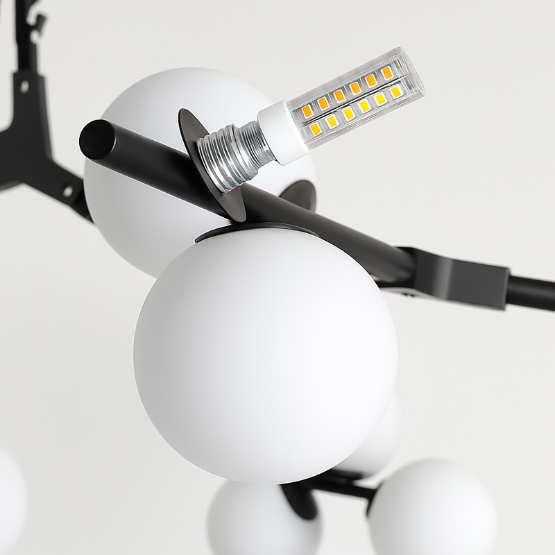 lustre moderne led avec branches d'arbre et boules de verre