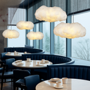 Moderner LED-Kronleuchter in schwebender Wolkenform für Restaurant