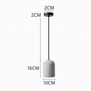 Suspension design cylindrique en ciment façon terrazzo LED