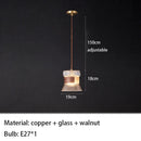 suspension-moderne-en-verre-transparent-avec-d-tails-en-bois-et-cuivre-8.png