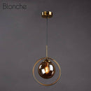 Suspension design boule en verre fumé Hang