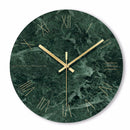 Horloge murale ronde design en verre style marbre vert et détails dorés 30cm