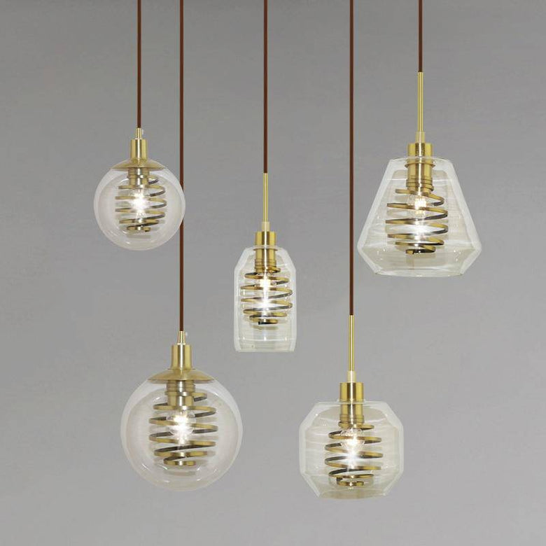 Suspension design en verre avec spirale dorée
