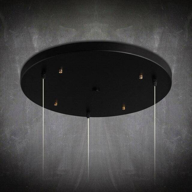 Suspension design à LED en verre et cage dorées