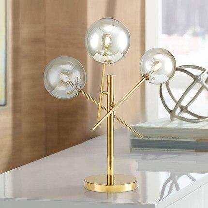Lampe à poser design dorée et boules en verre - vue 3 sur 5