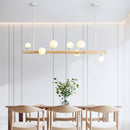 Lustre scandinave LED allongé en bois et boules en verre