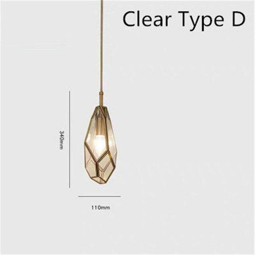Suspension design dorée en métal et verre de plusieurs formes