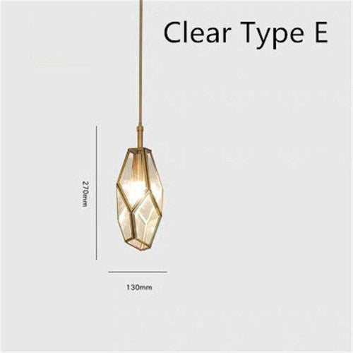 Suspension design dorée en métal et verre de plusieurs formes