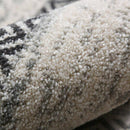 Tapis rond gris et noir aux motifs géométriques Nordic