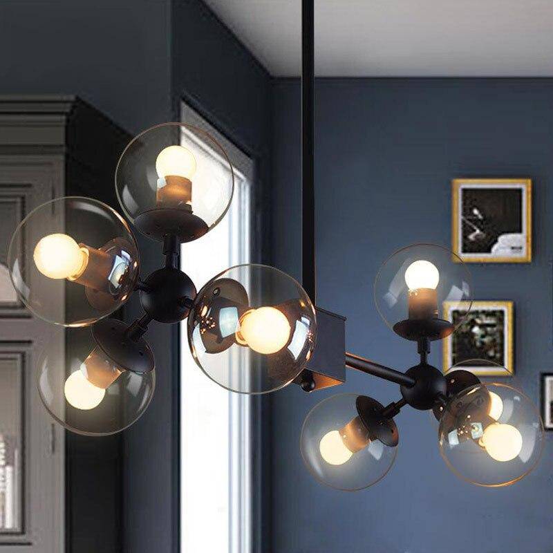 Suspension design avec lampe dans boule de verre