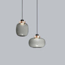 LED-Design-Pendelleuchte mit Glaskugel und kupferfarbenem Ring