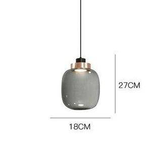 Suspension design LED avec sphère en verre et cercle cuivré