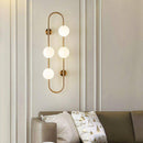 Design-Wandleuchte LED mit Metallring und Glaskugel