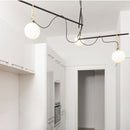 Lustre moderne LED avec un globe en verre Aitné