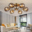 Moderne LED-Deckenleuchte mit Stern-Design und Glaskugeln Iraide