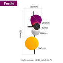 Design-Wandleuchte mit LED und farbigen Metallscheiben Lasha