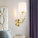Design-Wandleuchte LED aus Metall mit Hirschmotiv in Gold