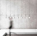 Suspension design boule accrochée Designer