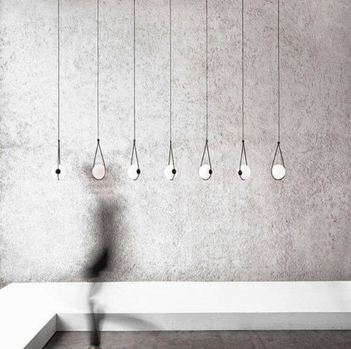 Suspension design boule accrochée Designer