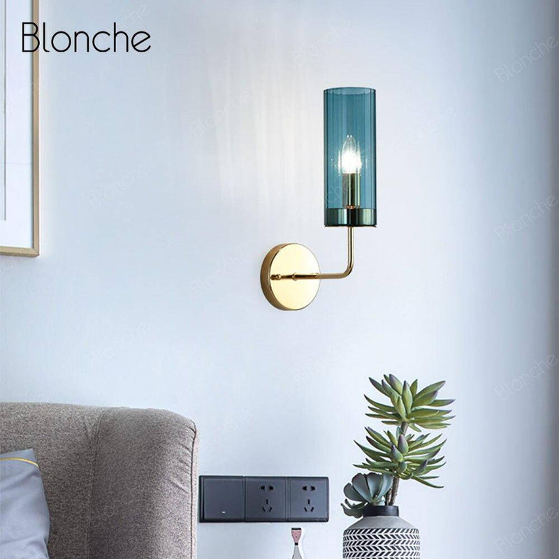 Applique murale design cylindrique en verre et base dorée